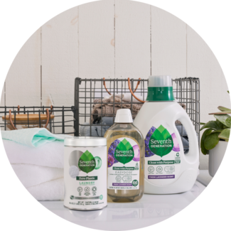 Seventh Generation 90oz, EasyDose, and Zero Plastic Laundry Detergents sitting on a washing machine